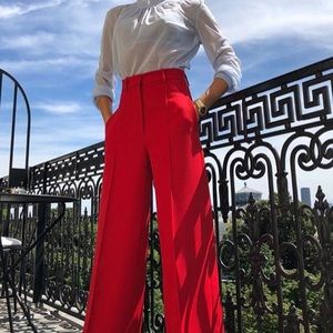 Red cropped/flared trousers